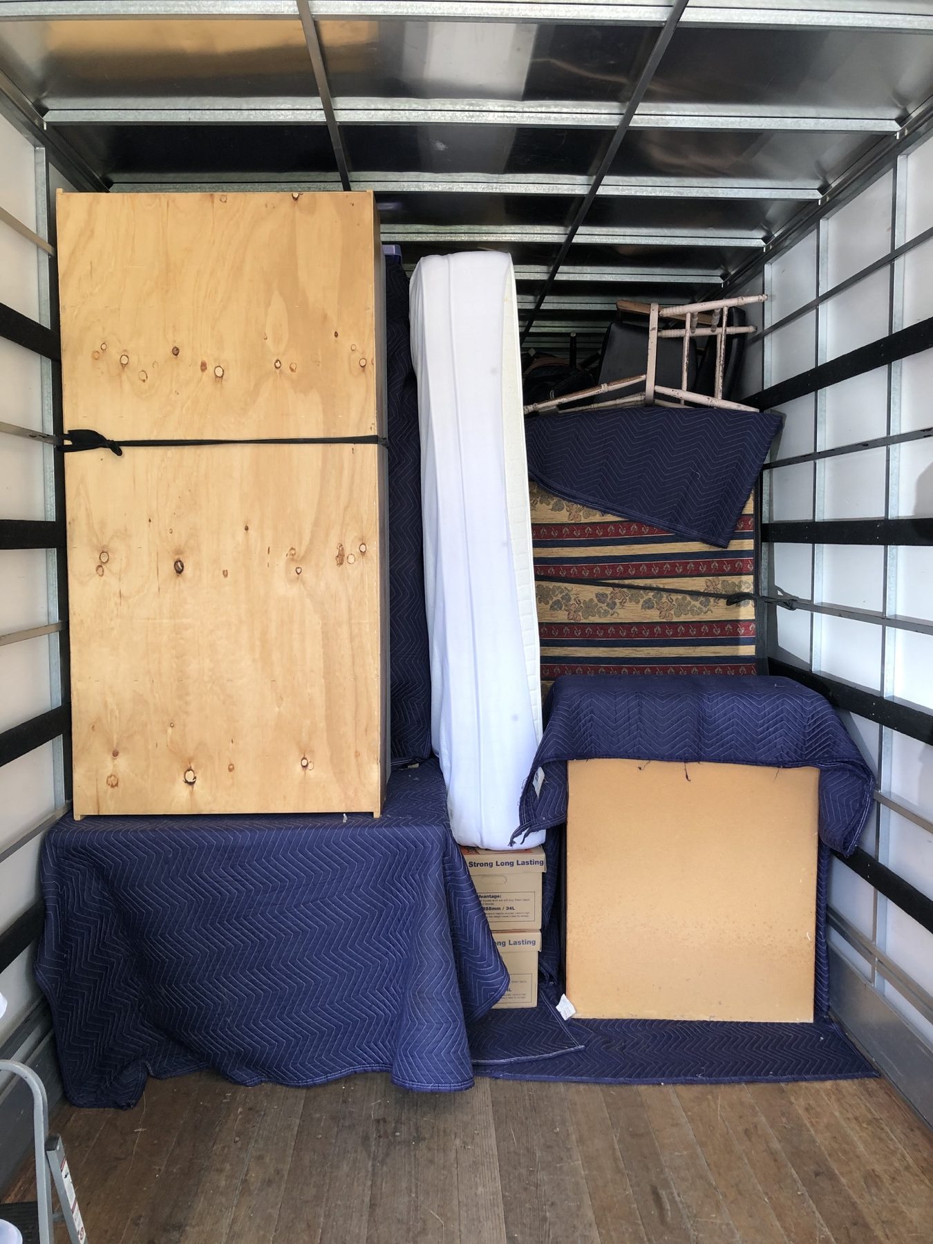 Protected large furniture loaded inside a JD Movers 12 tonne truck for a Murrumbeena to Bentleigh East Melbourne move