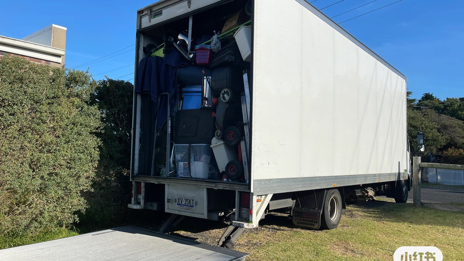 JD Movers truck positioned at a residential driveway during a real job relevant to Blackburn moves