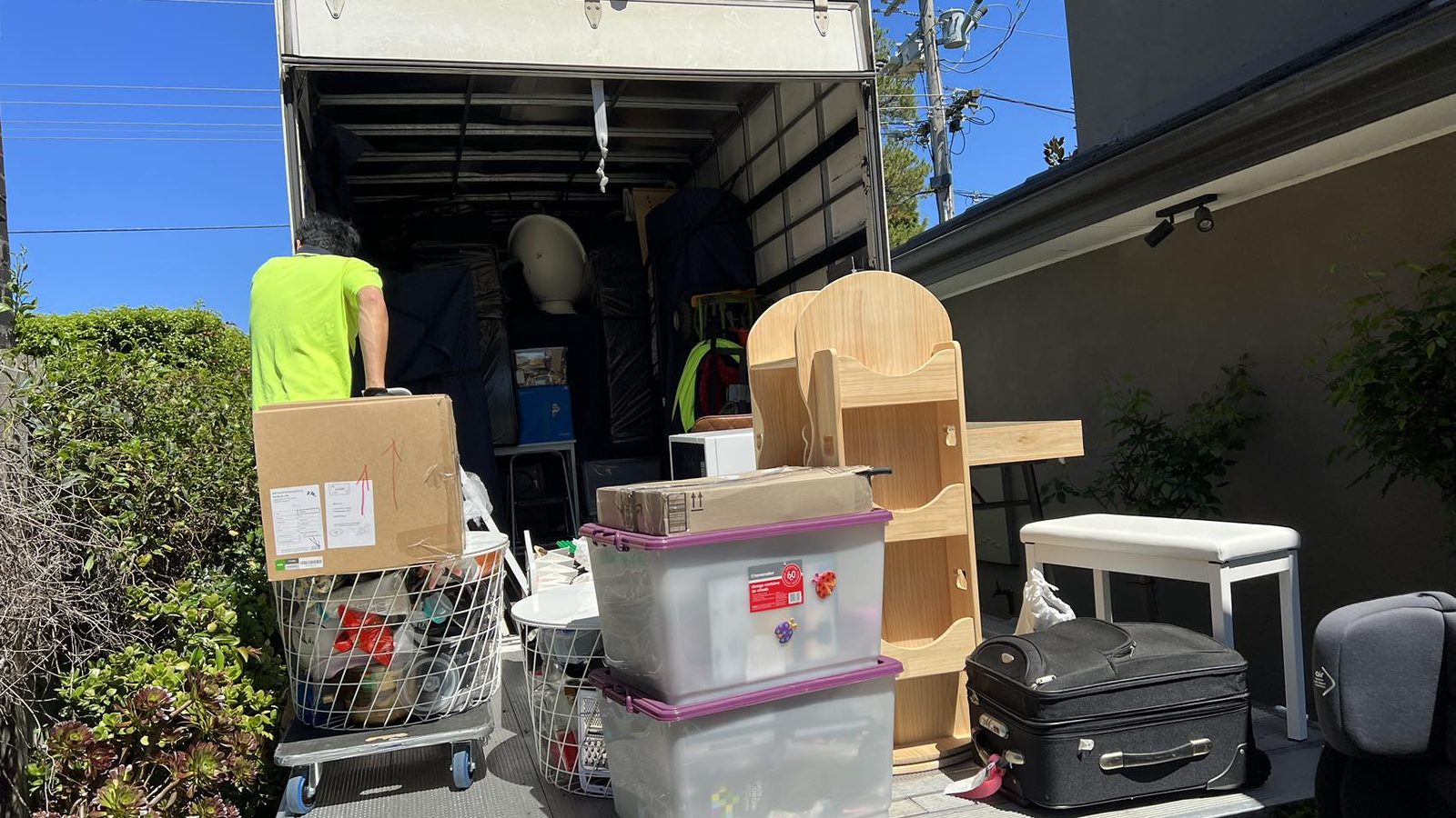 JD Movers staff loading household furniture and boxes in a separate real job, illustrating Carnegie move planning