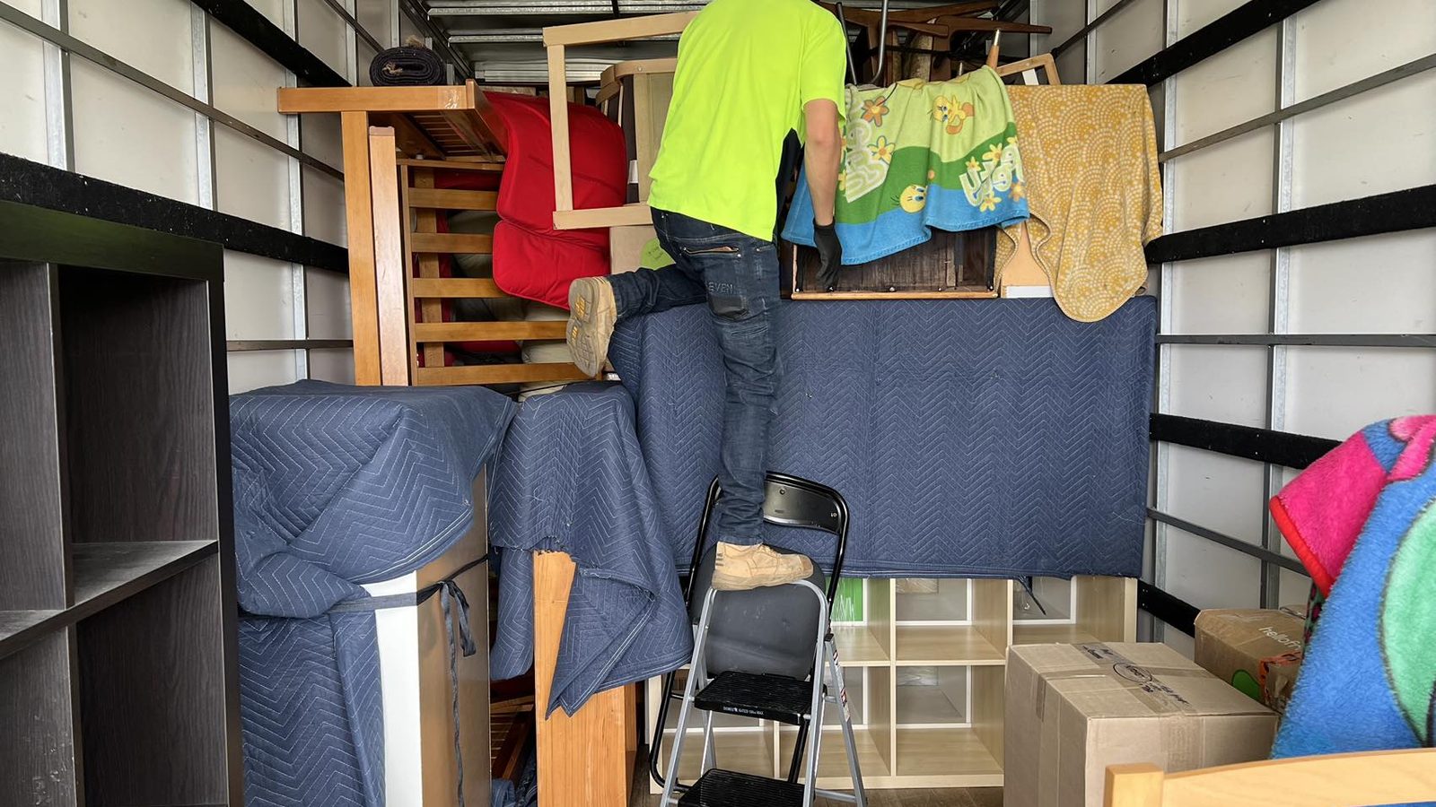 JD Movers staff loading protected household furniture during a real job relevant to Caulfield moves