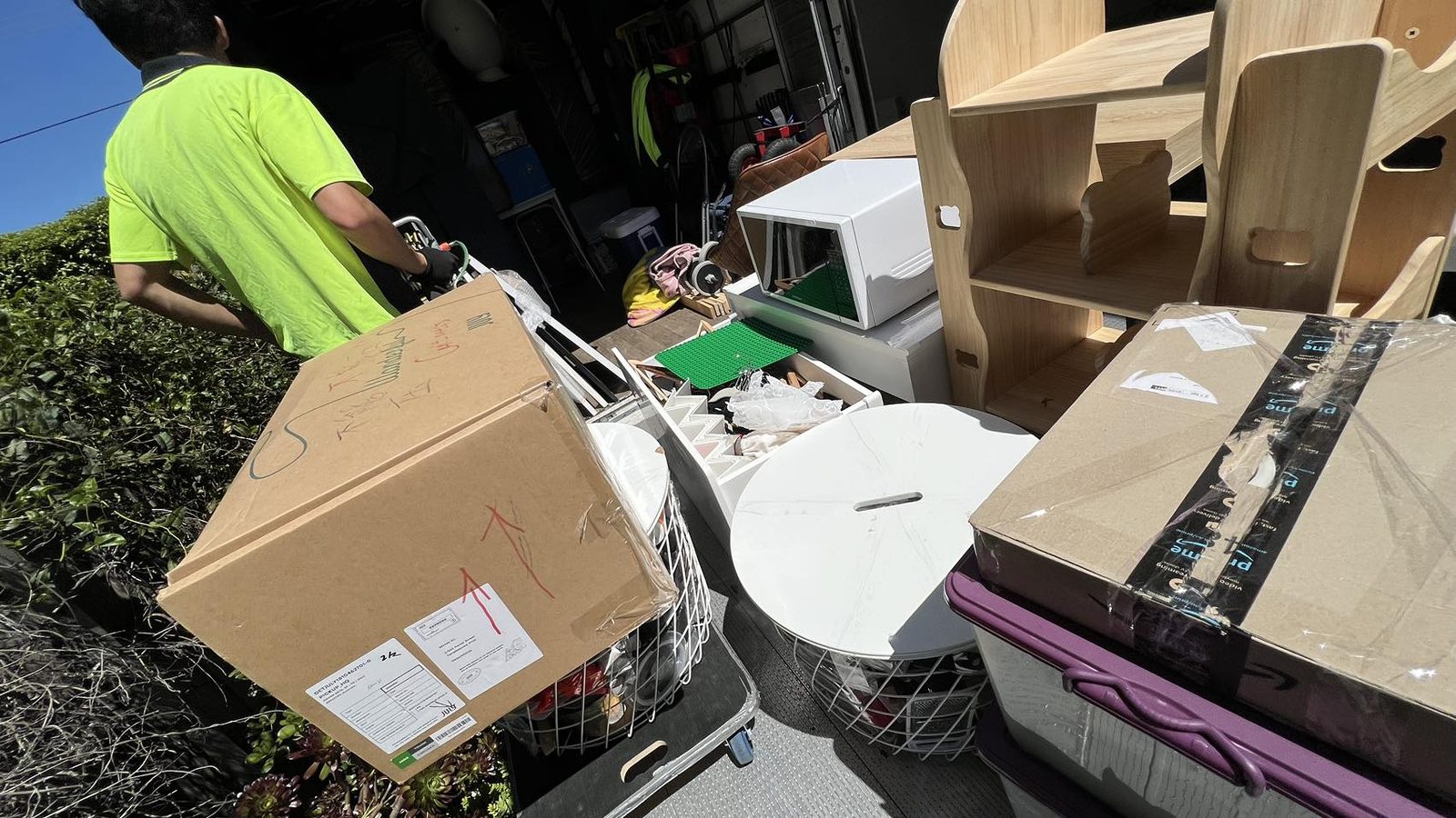 JD Movers staff loading household furniture during a real job relevant to Chelsea Heights moves