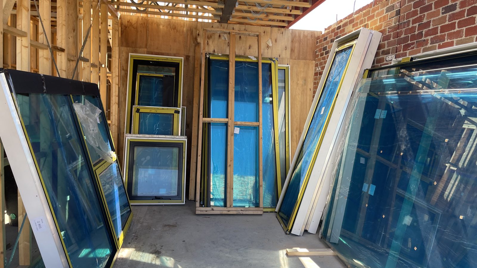 Door and window frames grouped for transport in a real JD Movers job, illustrating Fitzroy move planning