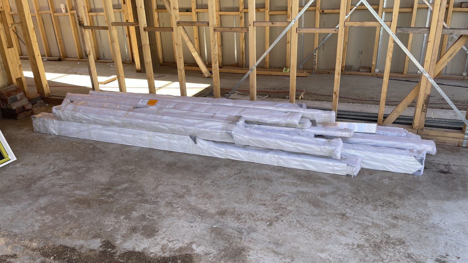 Oversized glass panels and frames prepared for handling in a real JD Movers job, illustrating Ivanhoe East move planning