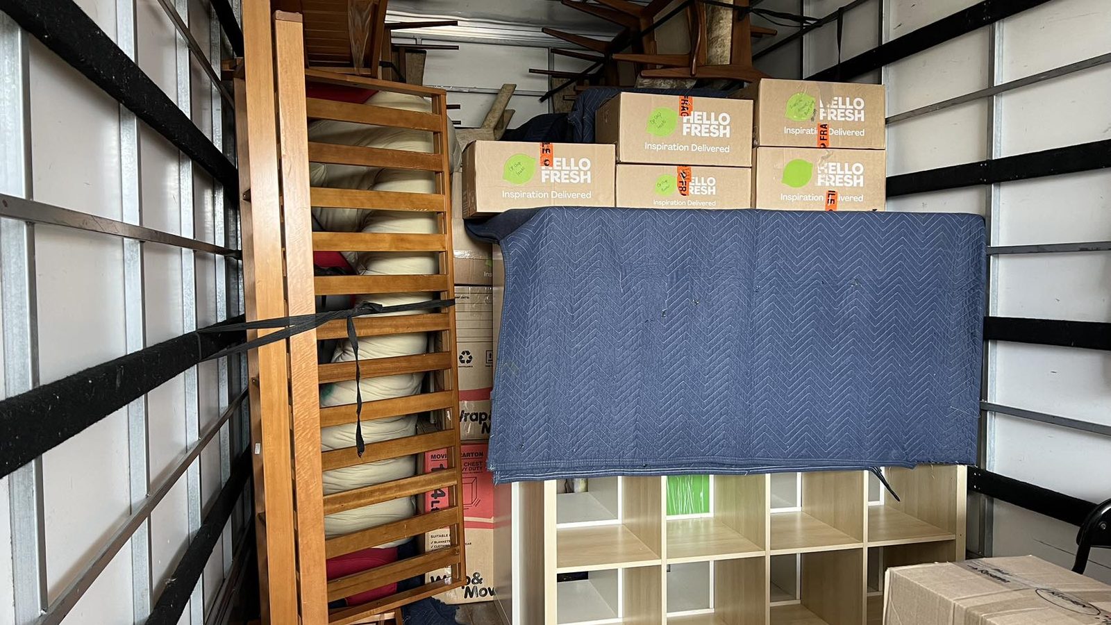 Protected household furniture loaded inside a real JD Movers truck, illustrating McKinnon move planning