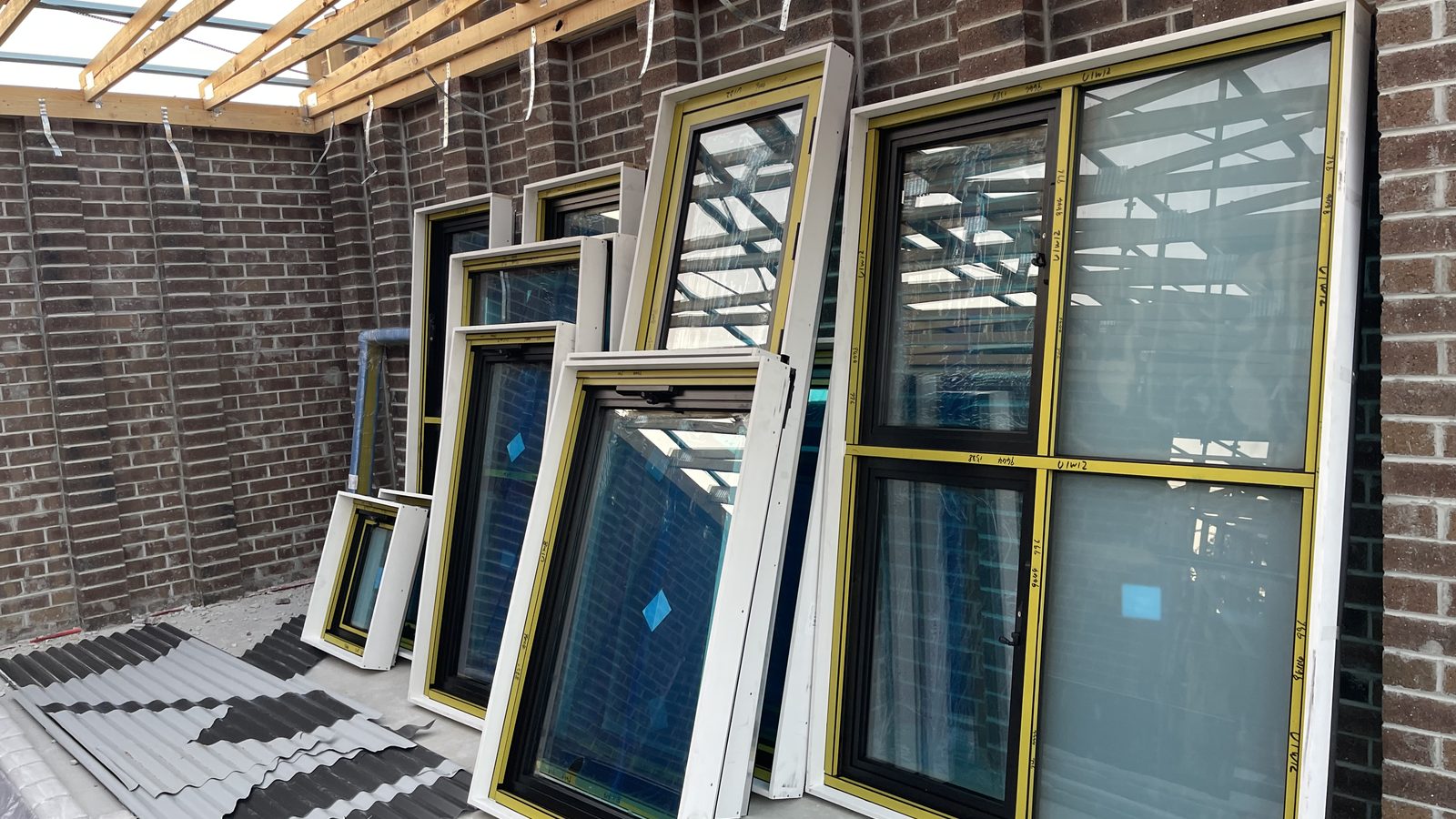 Multiple window frames grouped for a specialist move in a real JD Movers job, illustrating Mill Park move planning
