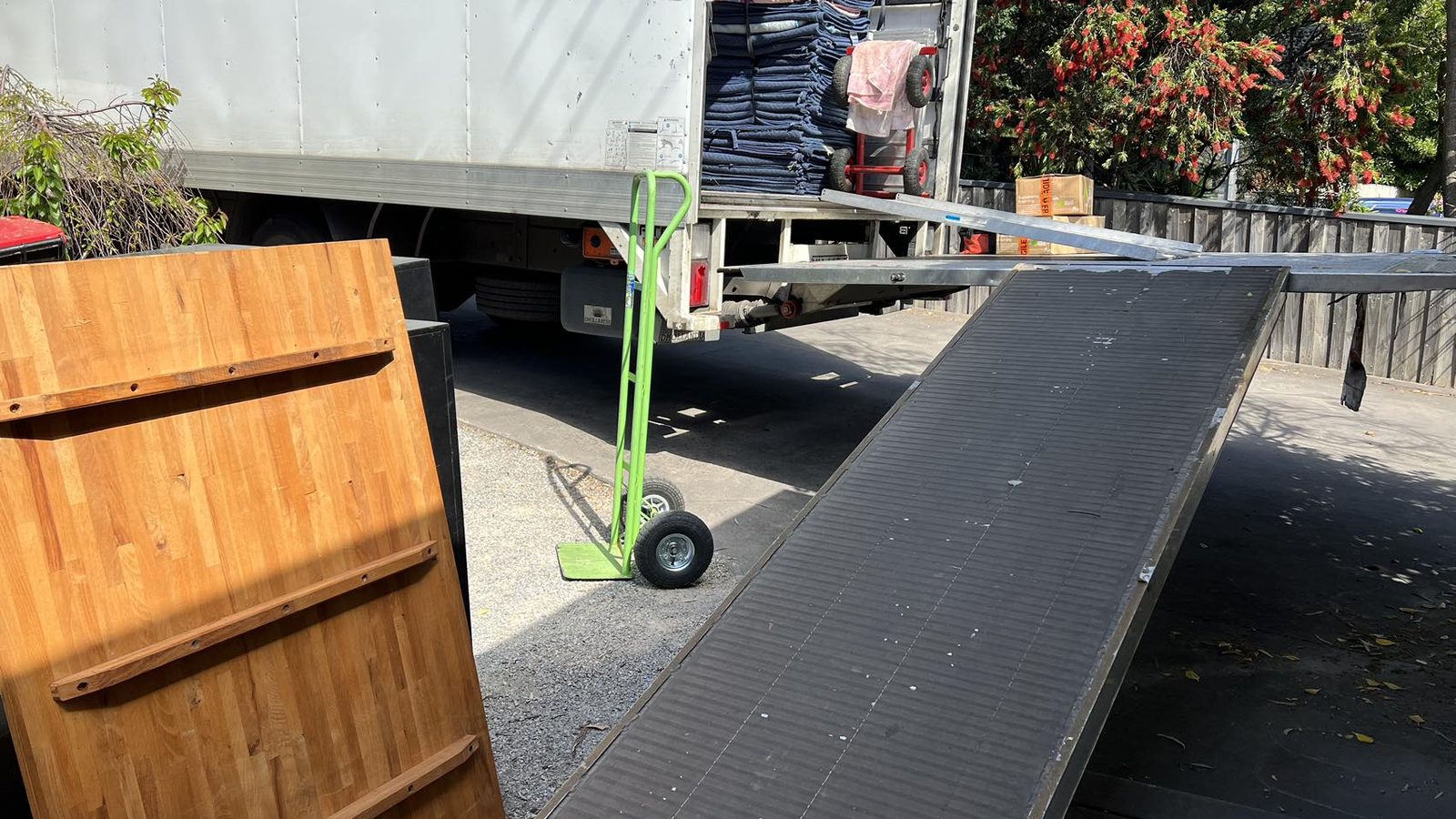 Truck ramp and trolley positioned for a Mitcham furniture move by JD Movers