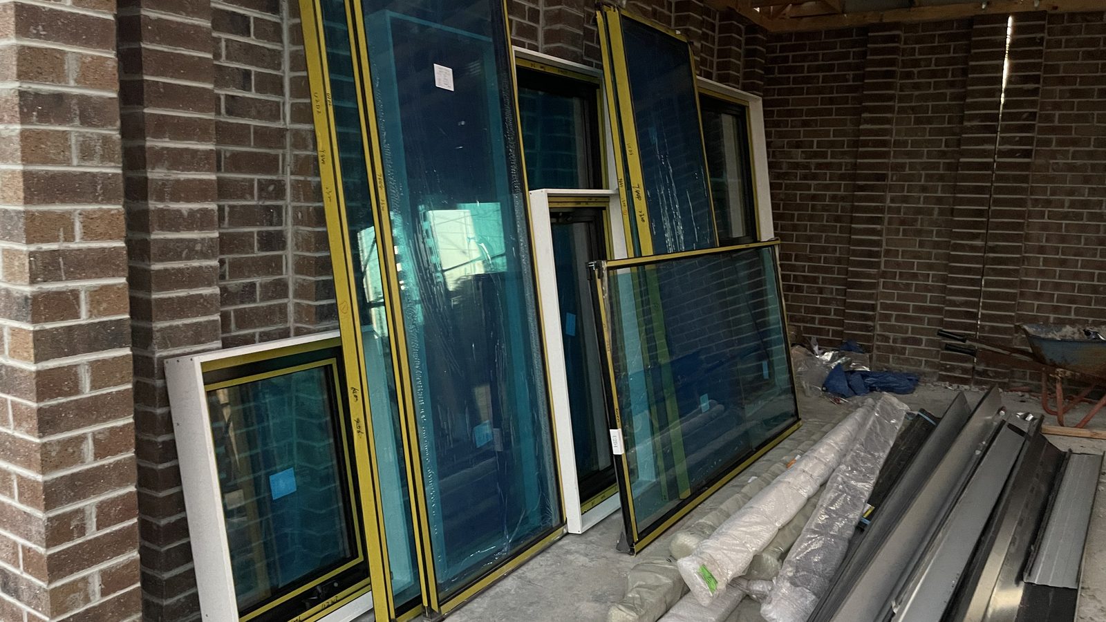 Large framed panels staged safely against a wall in a real JD Movers job, illustrating Rosanna move planning