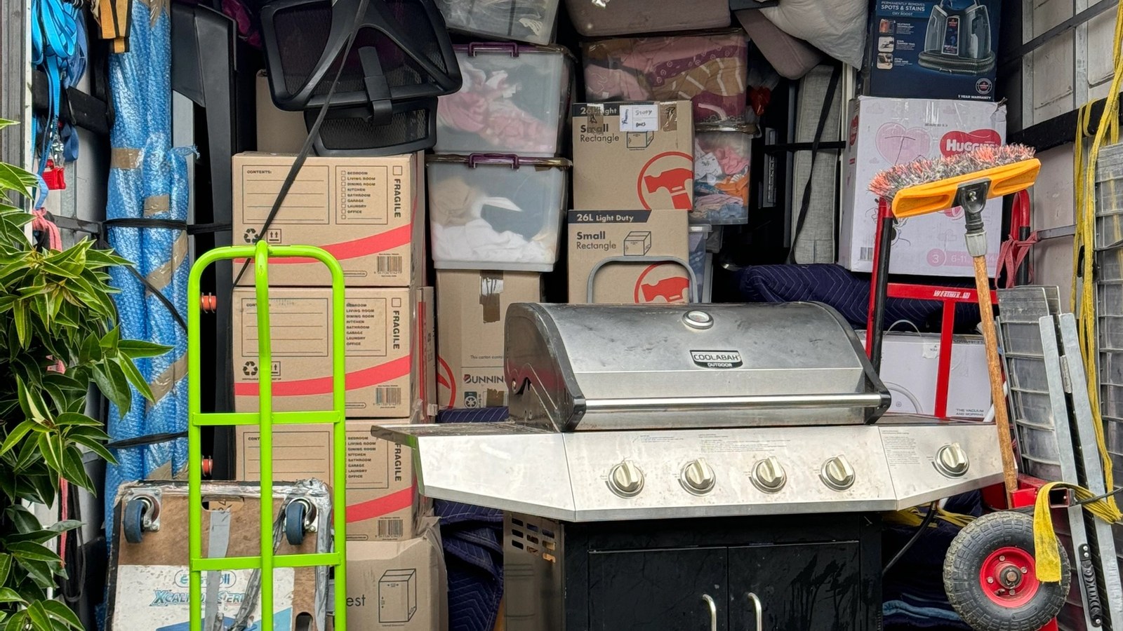 Household furniture and equipment arranged inside a real JD Movers truck, illustrating Templestowe moves