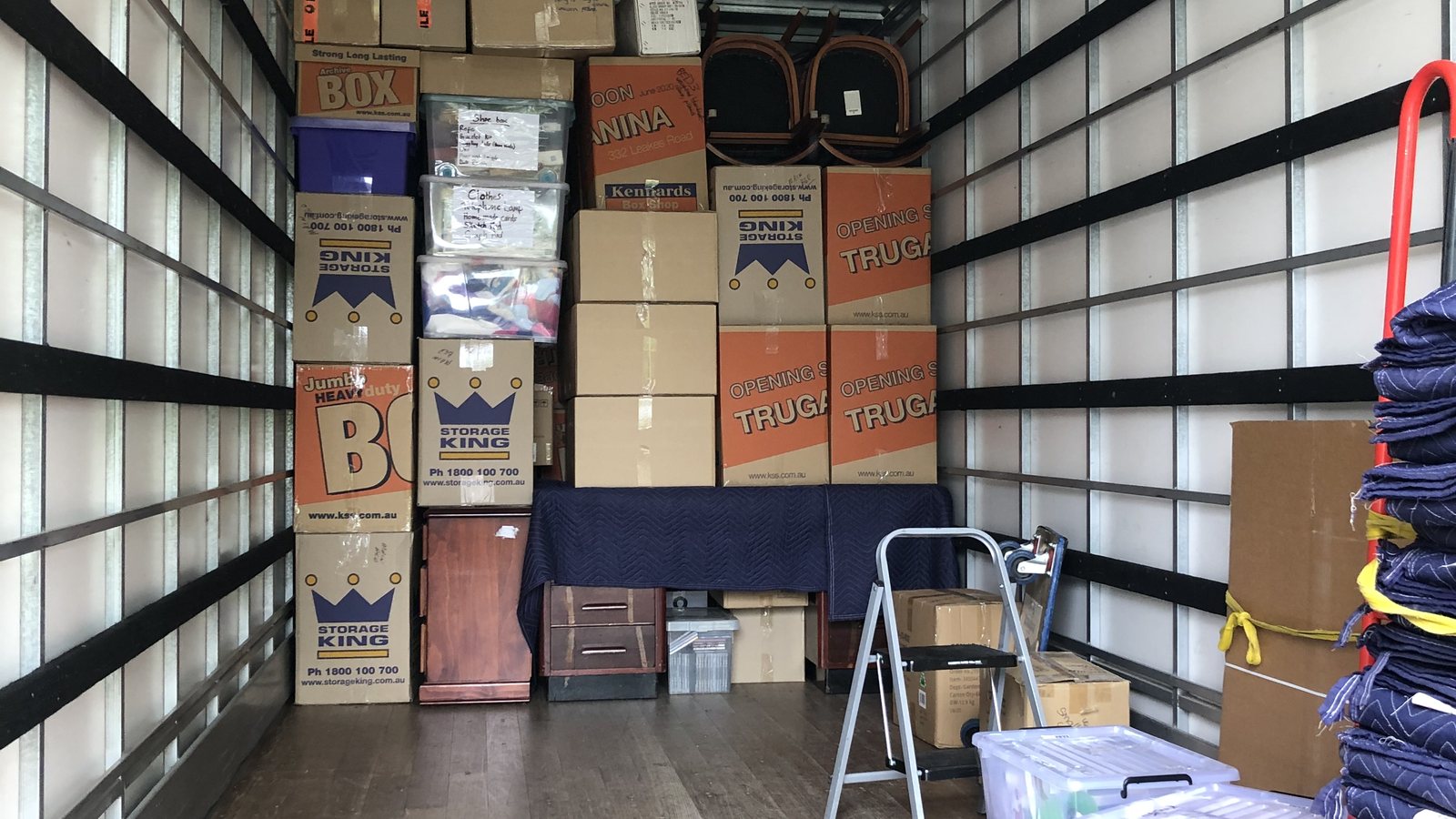 Protected cartons, furniture and fragile items loaded inside a real JD Movers truck for a Toorak move