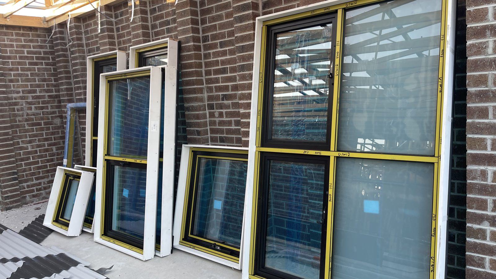 Large framed panels prepared upright in a real JD Movers job, illustrating Truganina move planning