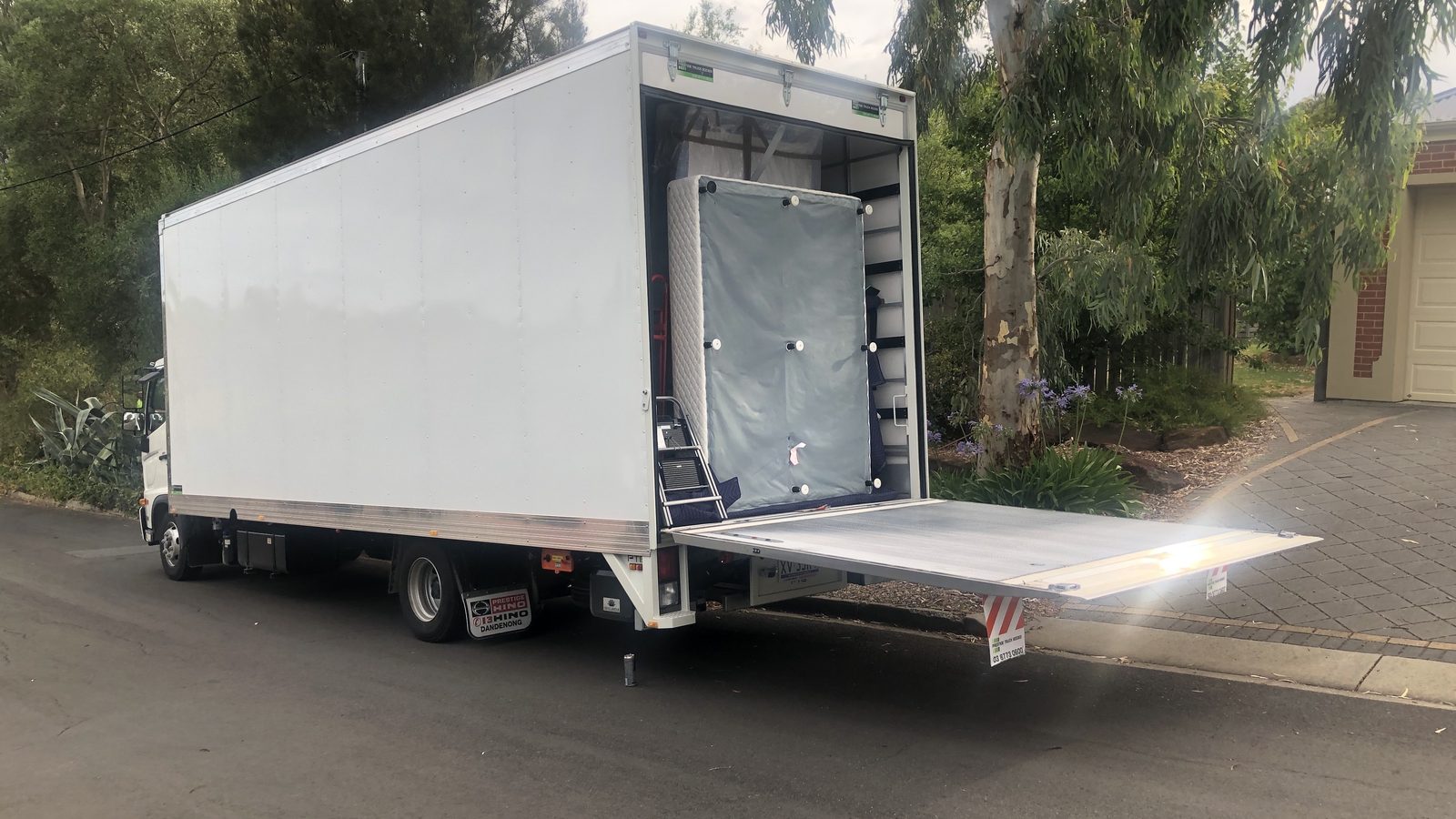 An empty moving truck with its loading ramp prepared in a real JD Movers job, illustrating Upper Ferntree Gully move planning