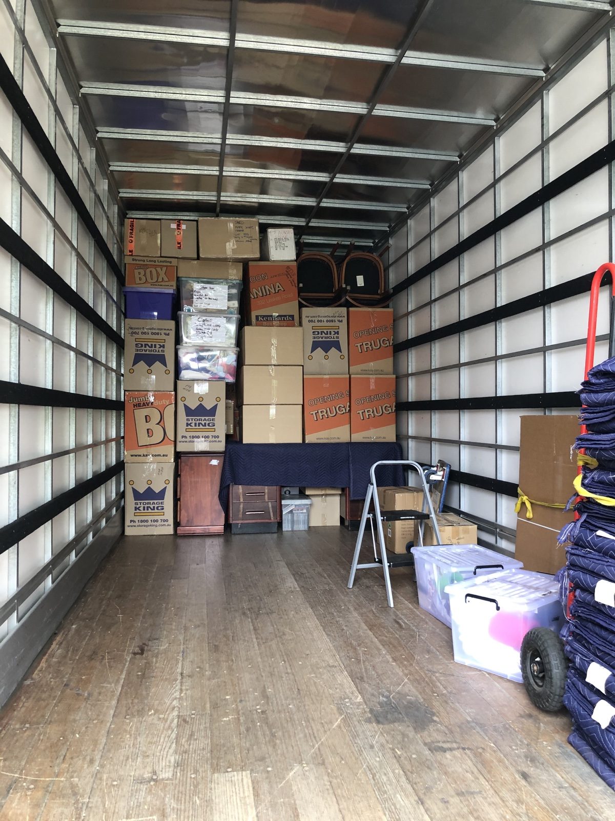 Boxes fragile items and moving blankets loaded inside a JD Movers 12 tonne truck for a Vermont Melbourne move